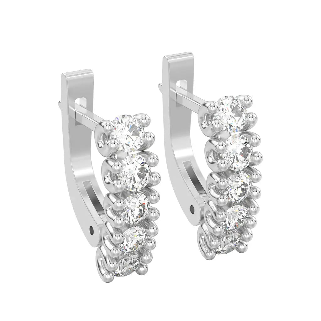 Fine diamond and gold earrings including studs, hoops and drops