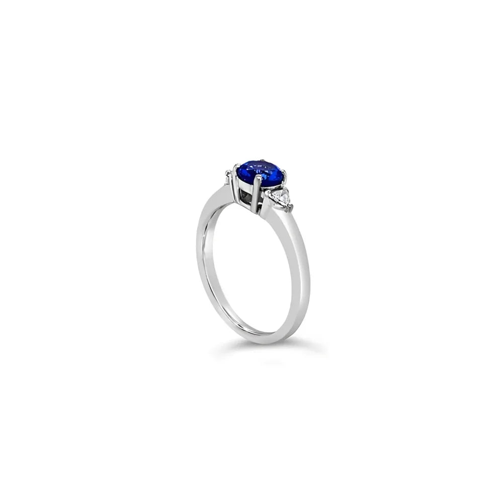 (REF 1189) 0.91ct DIAMOND 0.75ct TRILOGY 0.16ct TANZANITE RING (18CT WHITE GOLD)