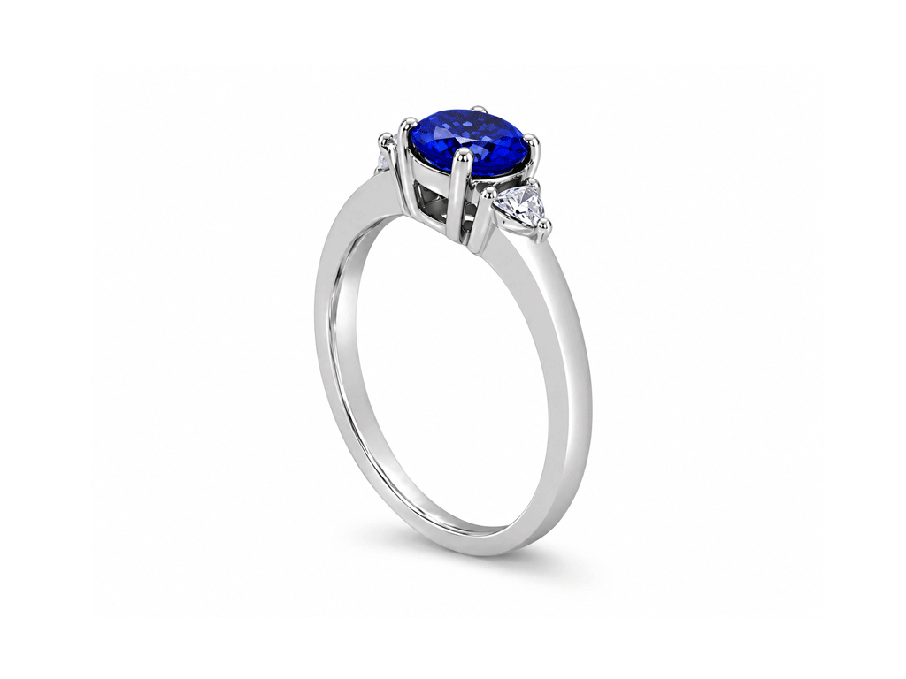 0.75ct Tanzanite & 0.16ct Diamond Trilogy Ring – 18ct White Gold